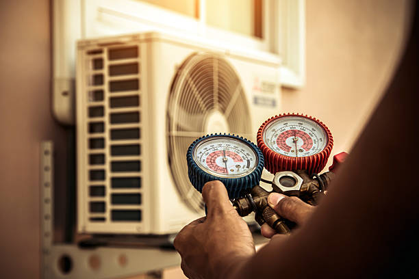 Professional Ductwork Repair technician working in Bertram, TX